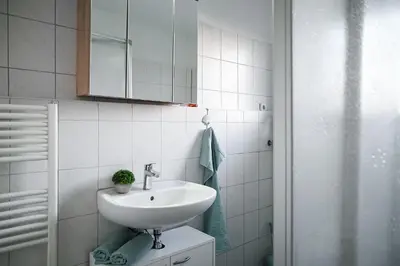 Ein Badezimmer in der Unterkunft JuPa Homes gemütliches DG Apartment