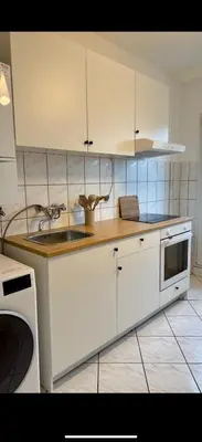 Küche/Küchenzeile in der Unterkunft Dachnest Gemütliche Wohnung im Herzen Düsseldorf
