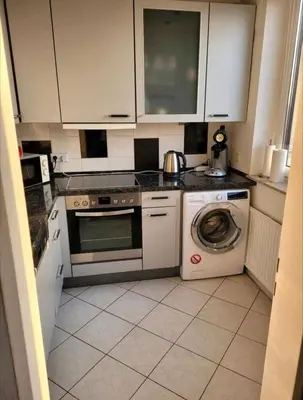 Küche/Küchenzeile in der Unterkunft Sarra&Mo Ferienwohnung