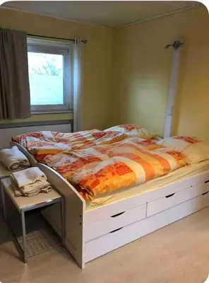 Ein Bett oder Betten in einem Zimmer der Unterkunft Modernes Studio Apartment im Düsseldorfer Norden