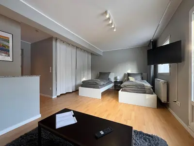 Ein Bett oder Betten in einem Zimmer der Unterkunft Fitzroy Apartment