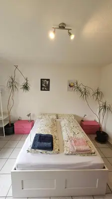 Ein Bett oder Betten in einem Zimmer der Unterkunft Holiday Everyday in Hemer