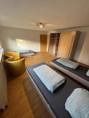 Ein Bett oder Betten in einem Zimmer der Unterkunft Schöne Apartments am Blaffertsberg RS01