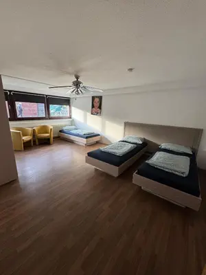 Ein Bett oder Betten in einem Zimmer der Unterkunft Schöne Apartments am Blaffertsberg RS01