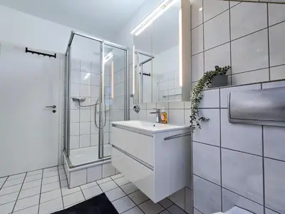 Ein Badezimmer in der Unterkunft Alpha Apartments