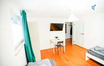 TV/Unterhaltungsangebot in der Unterkunft BEGE APARTMENTS TeamHome