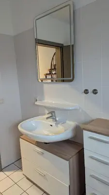 Ein Badezimmer in der Unterkunft Red Dot Apartment Lucky