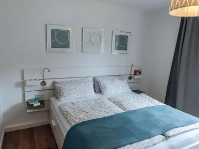 Ein Bett oder Betten in einem Zimmer der Unterkunft Apartment Casa Melisa - 61m2 by Interhome