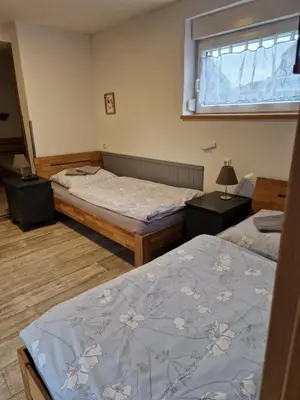 Ein Bett oder Betten in einem Zimmer der Unterkunft Pension Moers am Geleucht Fewo 1