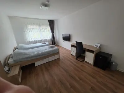 Ein Bett oder Betten in einem Zimmer der Unterkunft 3-Zimmer Wohnung - 3 OG