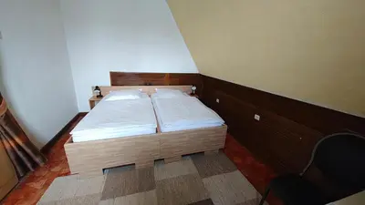 Ein Bett oder Betten in einem Zimmer der Unterkunft Park Hotel