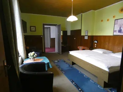 Ein Bett oder Betten in einem Zimmer der Unterkunft Park Hotel
