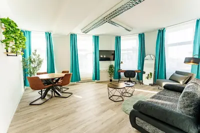 TV/Unterhaltungsangebot in der Unterkunft Modernes Apartment für 5 Personen mit Privatüarkplatz - Wlan und Kaffeevollautomat
