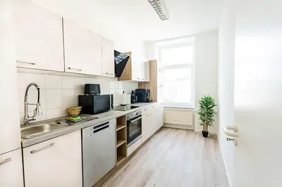 Küche/Küchenzeile in der Unterkunft Modernes Apartment für 5 Personen mit Privatüarkplatz - Wlan und Kaffeevollautomat