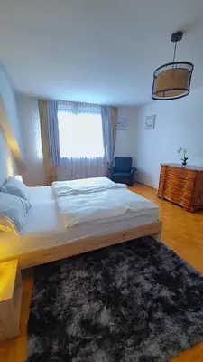 Ein Bett oder Betten in einem Zimmer der Unterkunft Zentrale Wohnung mit Wohnküche für bis 6 Gäste