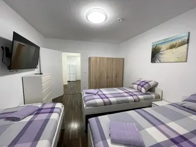 Ein Bett oder Betten in einem Zimmer der Unterkunft Voll ausgestattetes Apartment in Essen