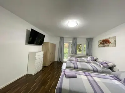 Ein Bett oder Betten in einem Zimmer der Unterkunft Voll ausgestattetes Apartment in Essen