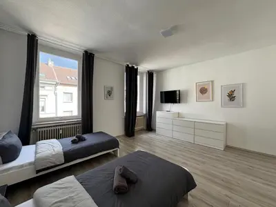 Ein Bett oder Betten in einem Zimmer der Unterkunft SAP09 Fitter's apartment Wuppertal