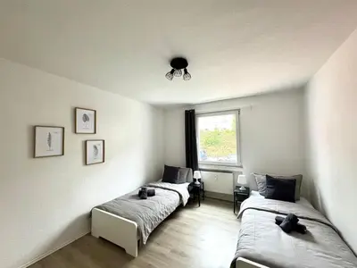 Ein Bett oder Betten in einem Zimmer der Unterkunft SAP07- Fitter's apartment in Ennepetal