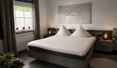Ein Bett oder Betten in einem Zimmer der Unterkunft Wellnesshaus - Whirlpool - Sauna - Relax
