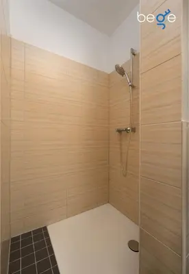 Ein Badezimmer in der Unterkunft BEGE APARTMENTS ComfortStay