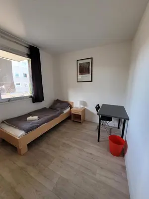 Ein Bett oder Betten in einem Zimmer der Unterkunft 5-Betten Unterkunft in Werne