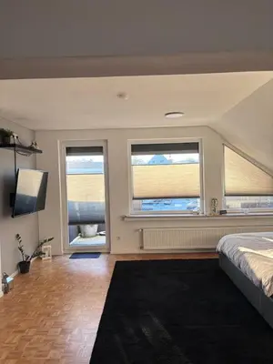 Ein Bett oder Betten in einem Zimmer der Unterkunft Juwel im POTT-Zentral-100 qm-Stellplatz-Balkon-Kamin