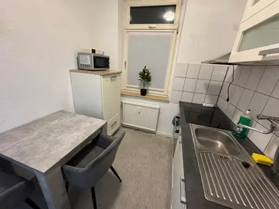 Küche/Küchenzeile in der Unterkunft Stylish Central Apartment Free Parking Free WiFi