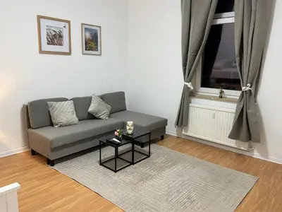 Ein Sitzbereich in der Unterkunft Stylish Central Apartment Free Parking Free WiFi