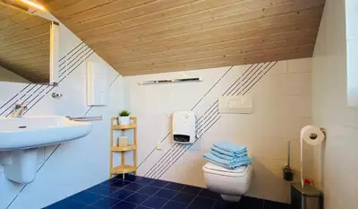 Ein Badezimmer in der Unterkunft LOEH38 Apartment Schalksmühle