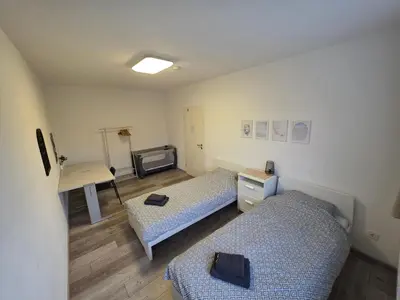 Ein Bett oder Betten in einem Zimmer der Unterkunft Doppelzimmer für bis zu 4 Personen - 4 OG