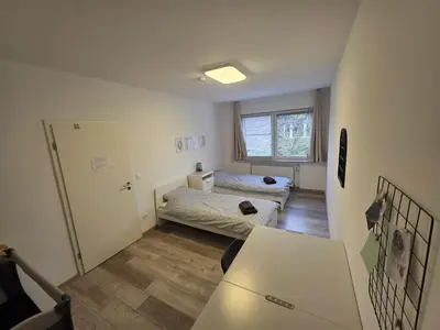Ein Bett oder Betten in einem Zimmer der Unterkunft Doppelzimmer für bis zu 4 Personen - 4 OG