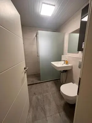 Ein Badezimmer in der Unterkunft Doppelzimmer für bis zu 4 Personen - 4 OG