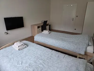 Ein Bett oder Betten in einem Zimmer der Unterkunft Einzelzimmer für bis zu 2 Personen - 3 OG