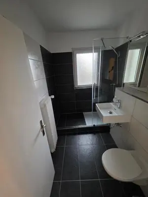 Ein Badezimmer in der Unterkunft Doppelzimmer für bis zu 4 Personen - 3 OG