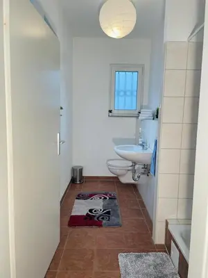 Ein Badezimmer in der Unterkunft Rundes Bungalow mit guten Anbindungen