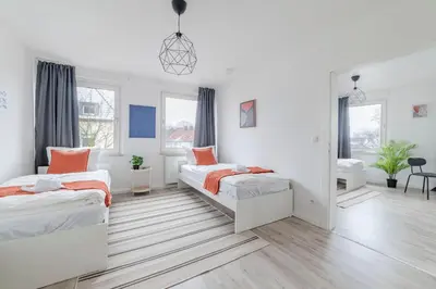 Ein Bett oder Betten in einem Zimmer der Unterkunft SpaceStays Apartment 4 Personen WLAN Smart-TV