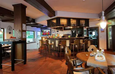 Ein Restaurant oder anderes Speiselokal in der Unterkunft Rooms by Ruhrpadel