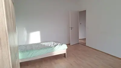 Ein Bett oder Betten in einem Zimmer der Unterkunft 4 Betten Bad WC Ideal für Kurzaufenthalt