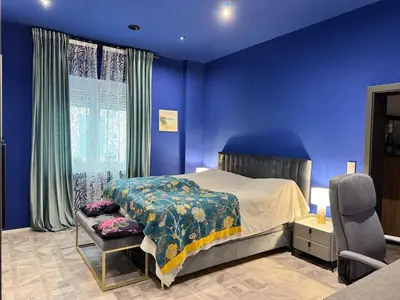 Ein Bett oder Betten in einem Zimmer der Unterkunft Midnight Loft