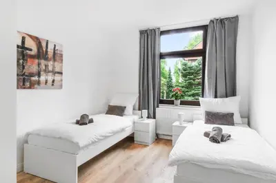 Ein Bett oder Betten in einem Zimmer der Unterkunft Sanierte 2 Zimmer Wohnung