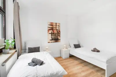 Ein Bett oder Betten in einem Zimmer der Unterkunft Sanierte 2 Zimmer Wohnung