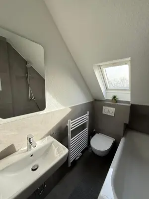 Ein Badezimmer in der Unterkunft Two-Bedroom Apartment