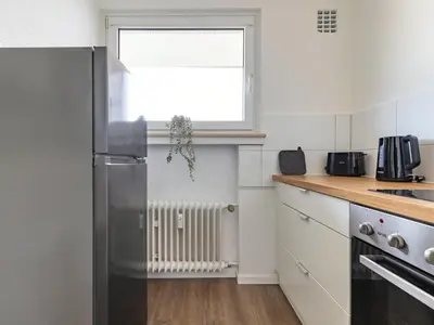 Küche/Küchenzeile in der Unterkunft BudgetRoom 3 Betten Küche Bad Studio