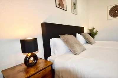Ein Bett oder Betten in einem Zimmer der Unterkunft SANO - Hagen - Am Rastebaum