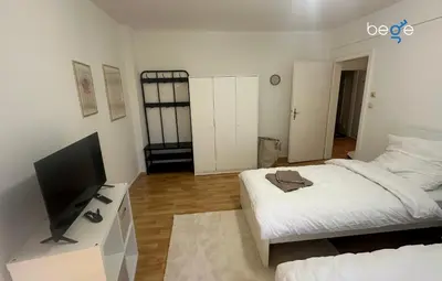 Ein Bett oder Betten in einem Zimmer der Unterkunft BEGE APARTMENTS CozyWork