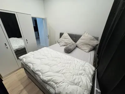 Ein Bett oder Betten in einem Zimmer der Unterkunft Central apartment in Essen city center