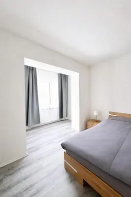 Ein Bett oder Betten in einem Zimmer der Unterkunft Helle Erdgeschosswohnung in Hamm für bis zu 4 Personen