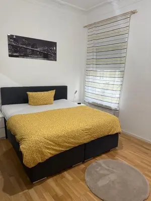 Ein Bett oder Betten in einem Zimmer der Unterkunft Sauberes Apartment in Hamm