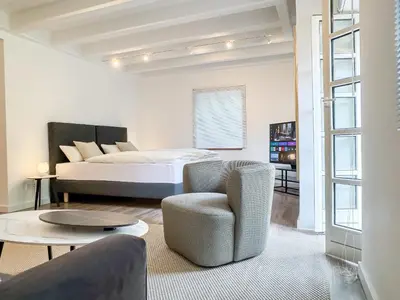 Ein Bett oder Betten in einem Zimmer der Unterkunft Gutshaus am Rhein